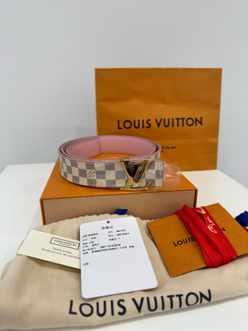 Louis Vuitton M0571U LV Reversible Belt with White Checkered Pattern and Pink, Gold Buckle, 30mm