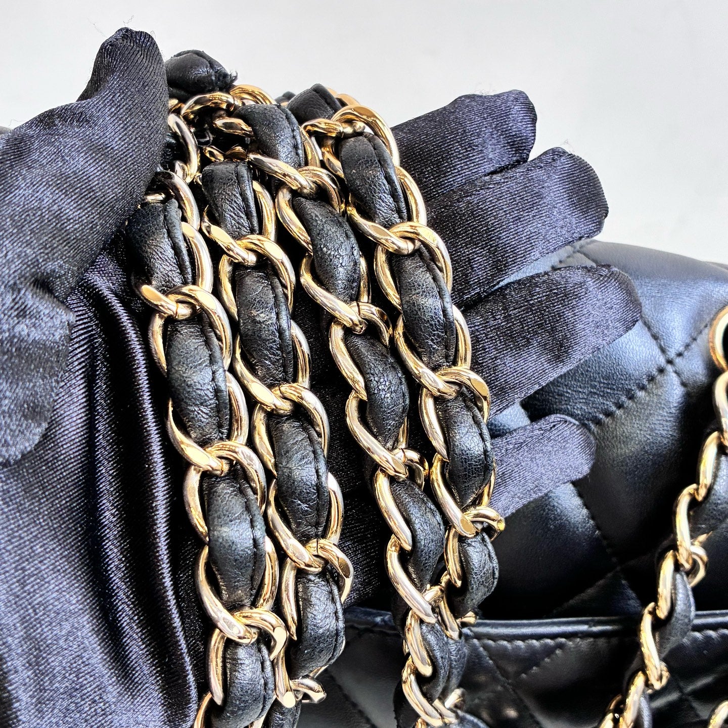 Chanel 14-inch 99% new CF medium size black and gold quilted lambskin dimensions 30*19.