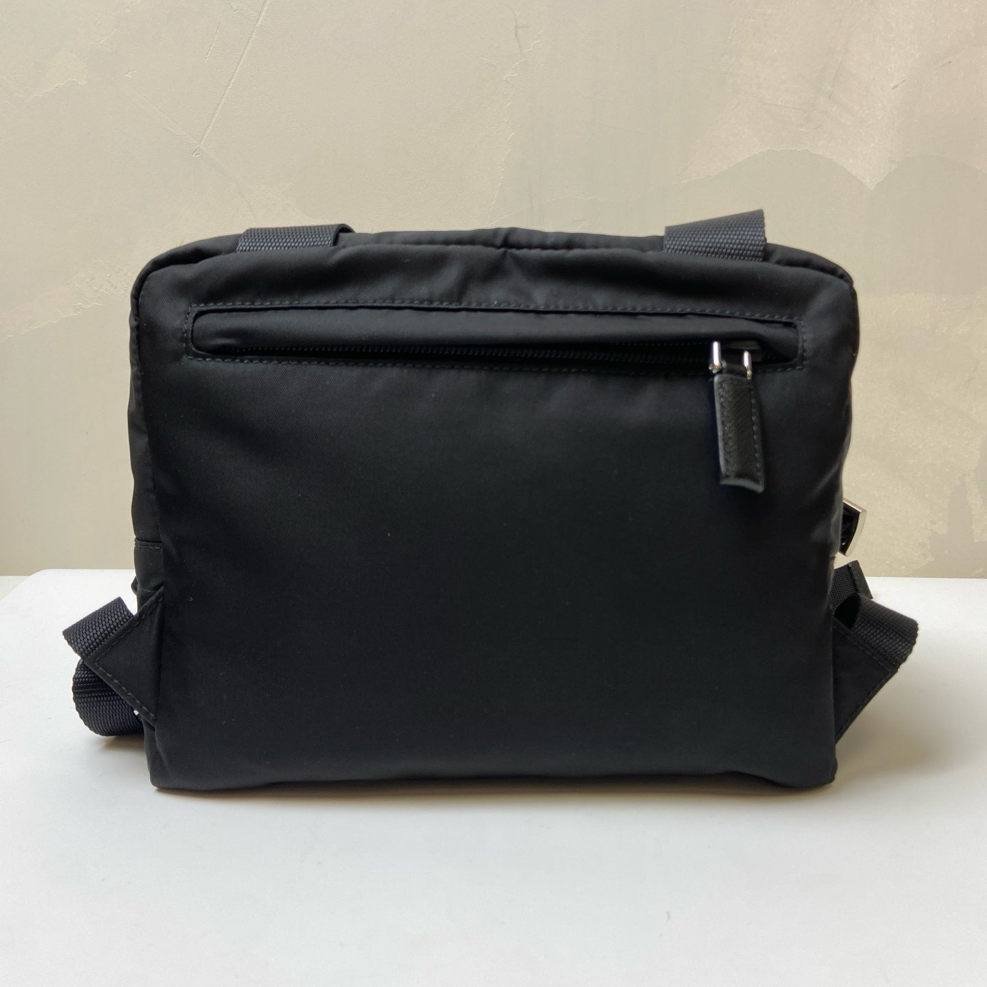 Prada Black and Silver Nylon Multifunctional Backpack Show Style, Backpack in 99% New Condition Dimensions: 22×17 Black and Silver Nylon Material