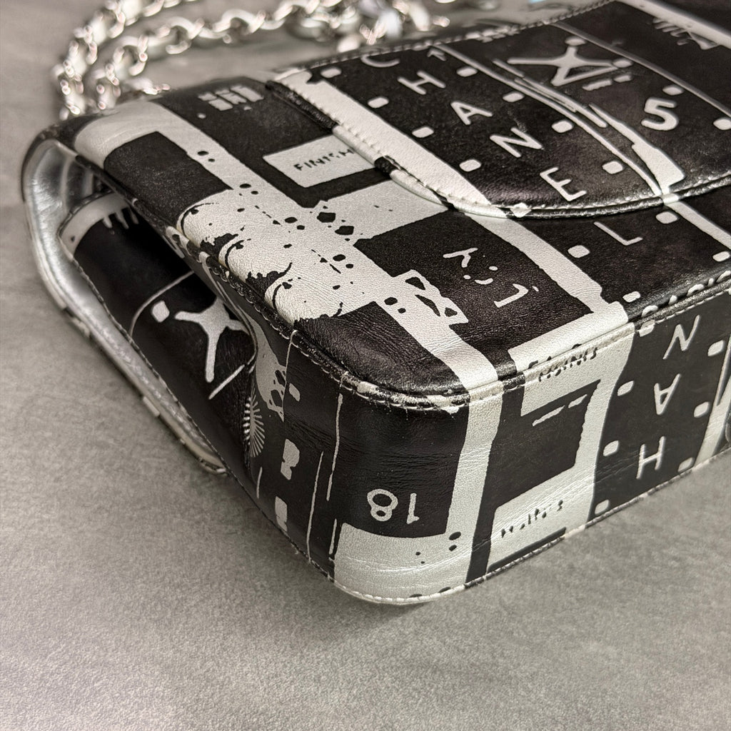 Chanel CF Medium Black and White Newspaper Graffiti Bag, three-dimensional shape, clean interior.