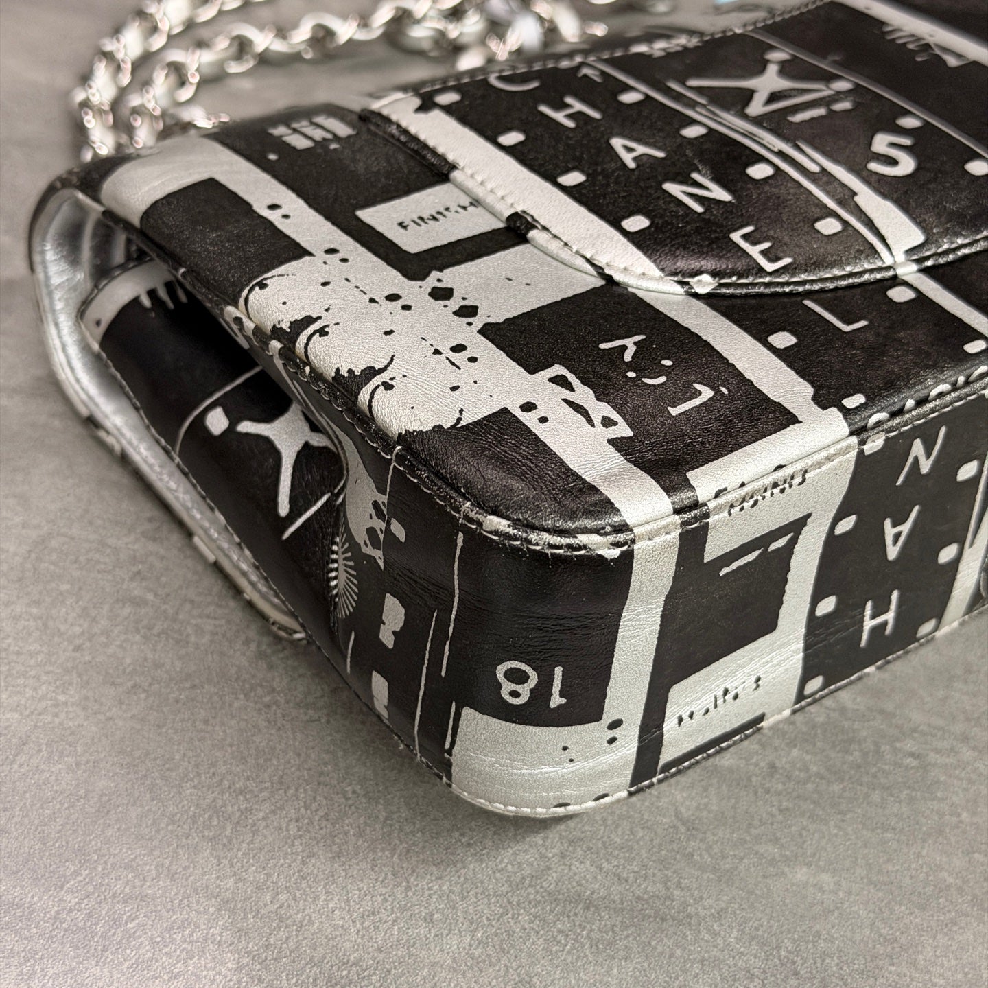 Chanel CF Medium Black and White Newspaper Graffiti Bag, three-dimensional shape, clean interior.