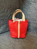 Hermès Picotin 22, tomato red body with rose pink handle, silver hardware, TC leather, X stamp, lock-free