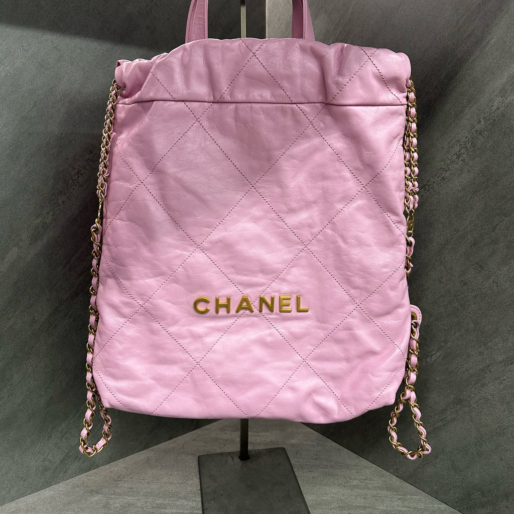 Chanel Pink and Gold Logo Quilted 22 Bag Small Backpack Chip (Consignment)