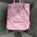 Chanel Pink and Gold Logo Quilted 22 Bag Small Backpack Chip (Consignment)