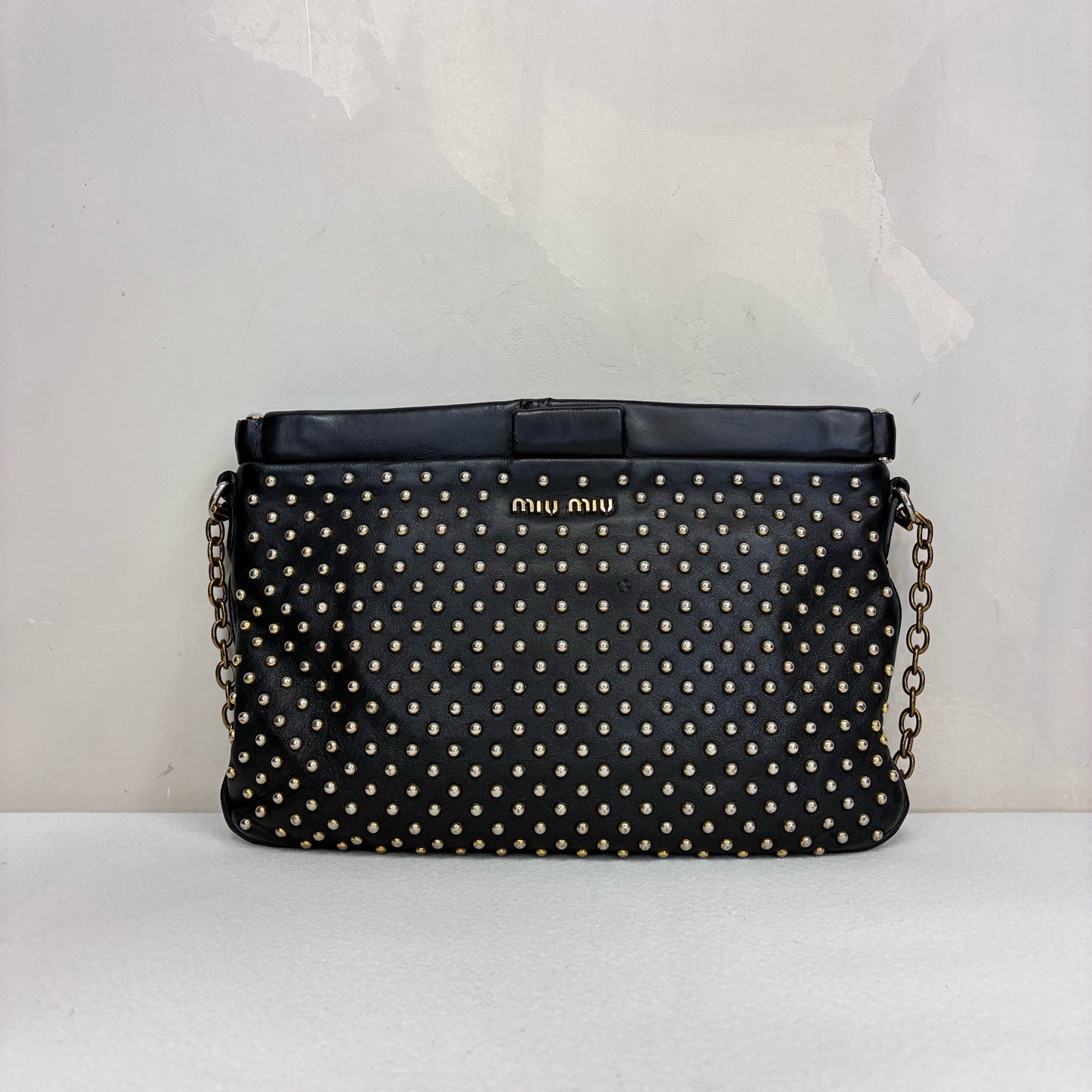 Miu Miu 95% new black studded clutch with gold stud embellishments, size: 18*14*5cm.