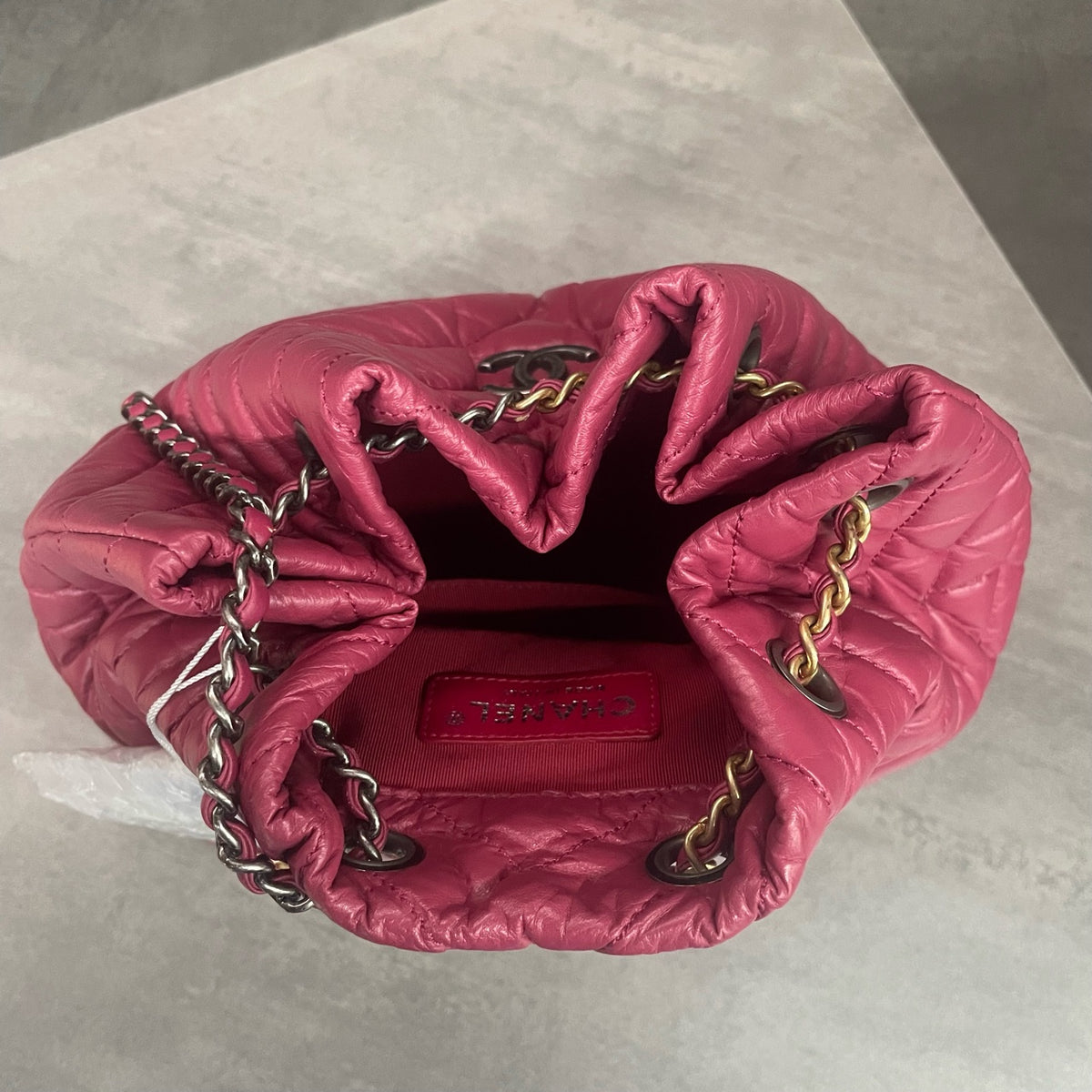 CHANEL Raspberry Pink V-Wave Mini Flap Bag with Crossbody Chain, 26 openings with card, in stock at a great price.