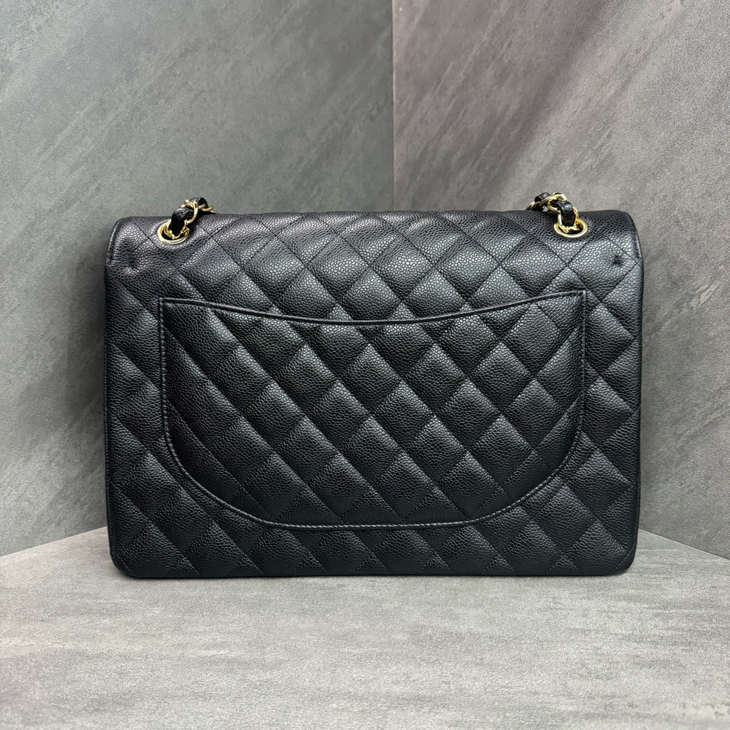 Chanel Black Gold Litchi Calfskin Maxi, full set with 28 serial number, structured shape, clean interior, in stock at a favorable price