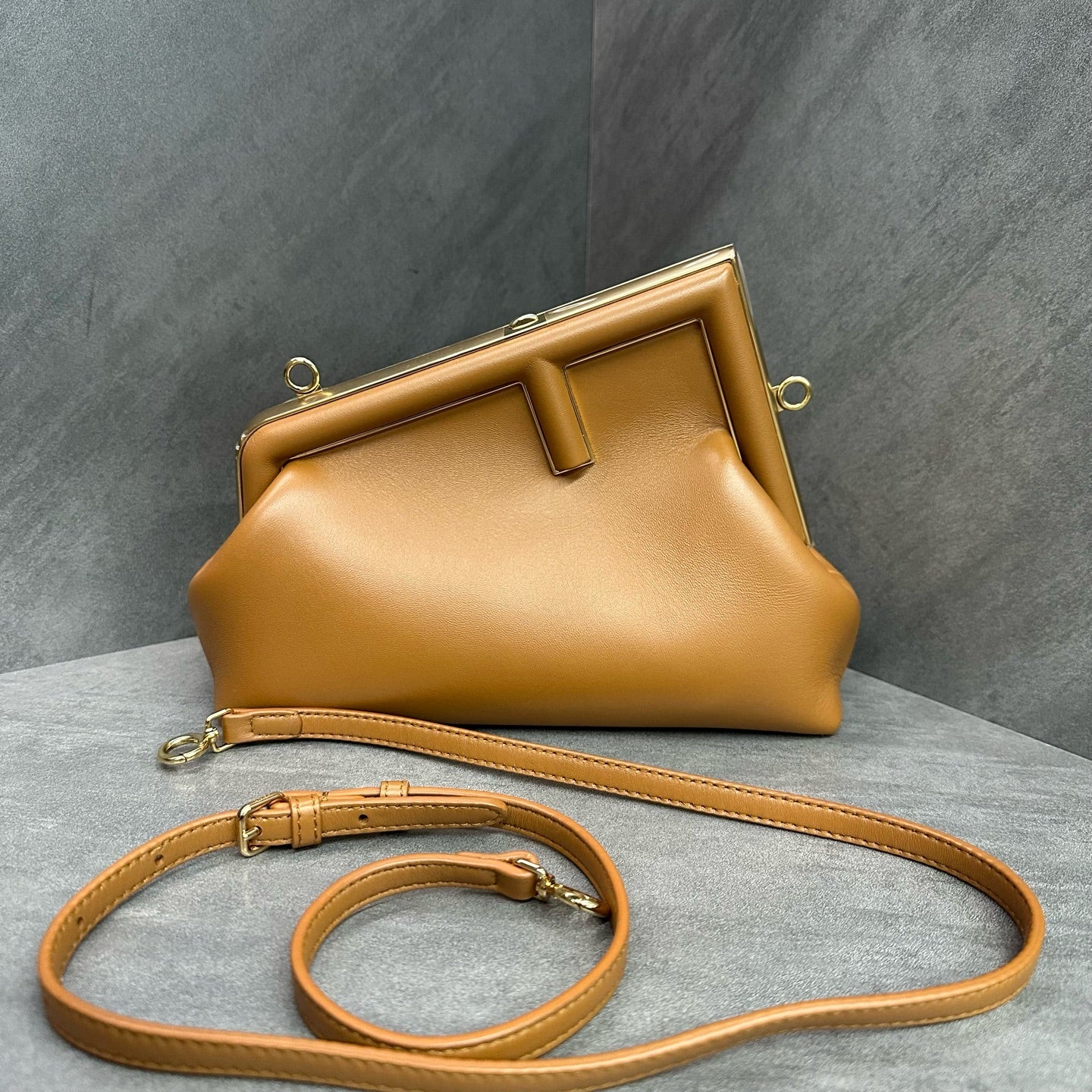 Fendi First F-shaped buckle lambskin clutch bag Caramel cloud bag crossbody bag