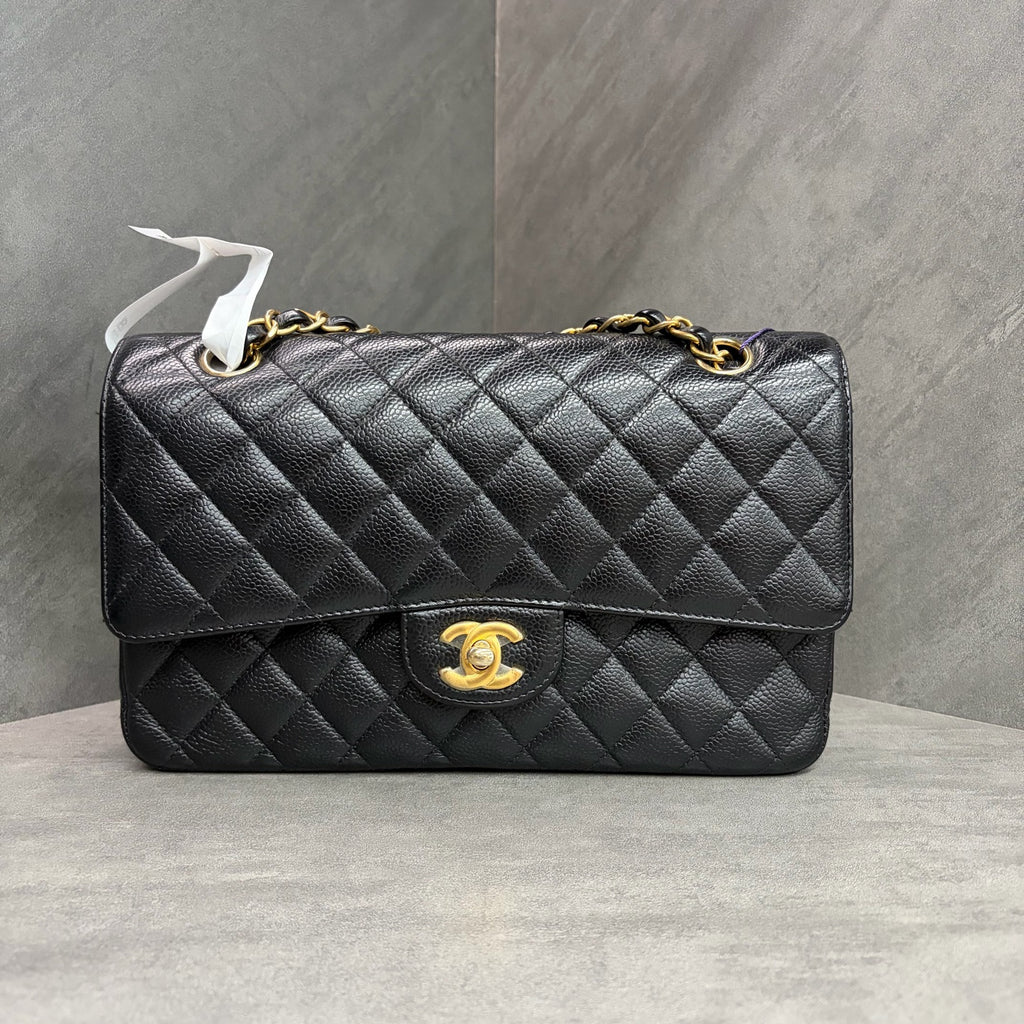 Chanel CF black gold lychee leather medium 26 open without card. The shape is three-dimensional and the interior is clean. Available in stock.