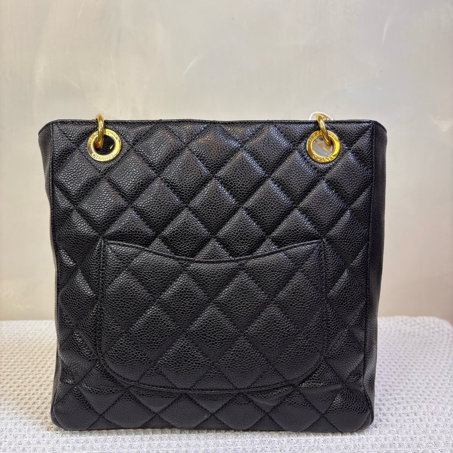 Chanel, 14K, PST black with gold hardware classic quilted textured leather shopping bag, shoulder tote bag dimensions: 25x9x23 cm, compact.
