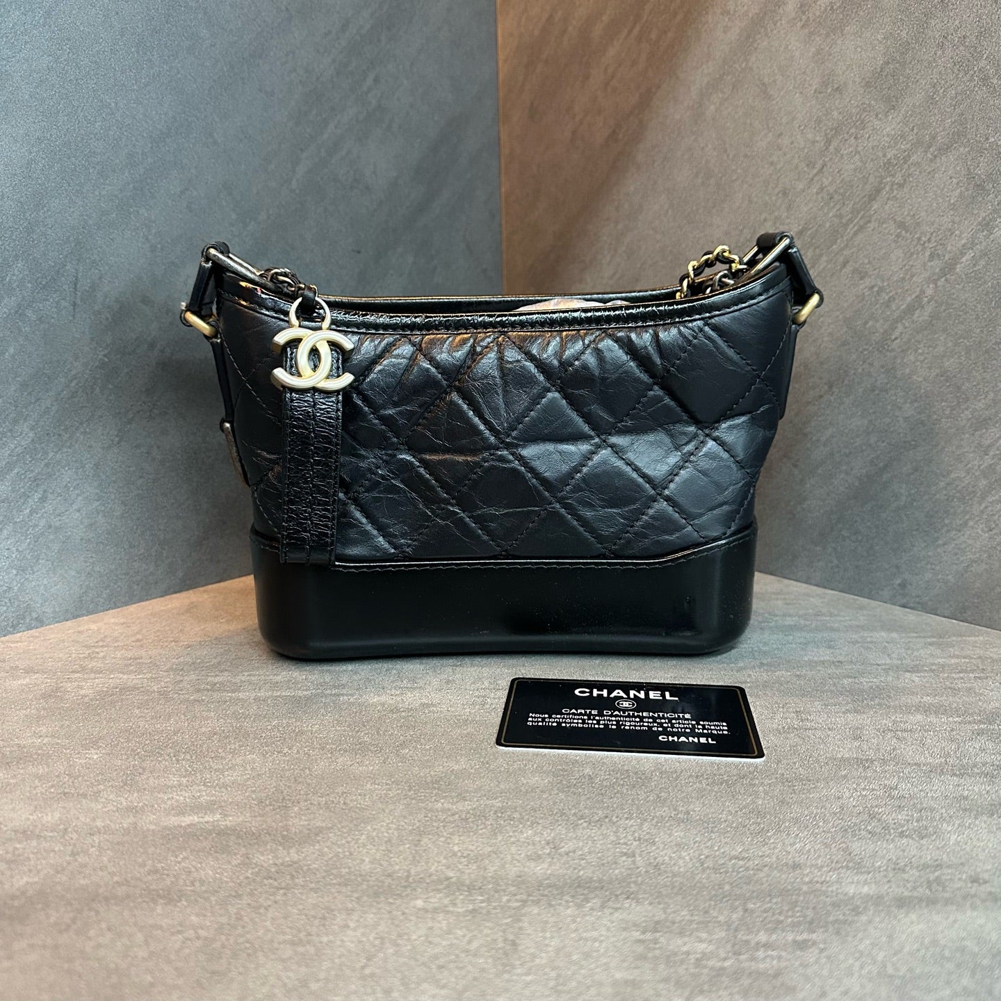 Chanel Black and Gold Small Gabrielle Bag, 25 serial with authenticity card, structured silhouette, clean interior