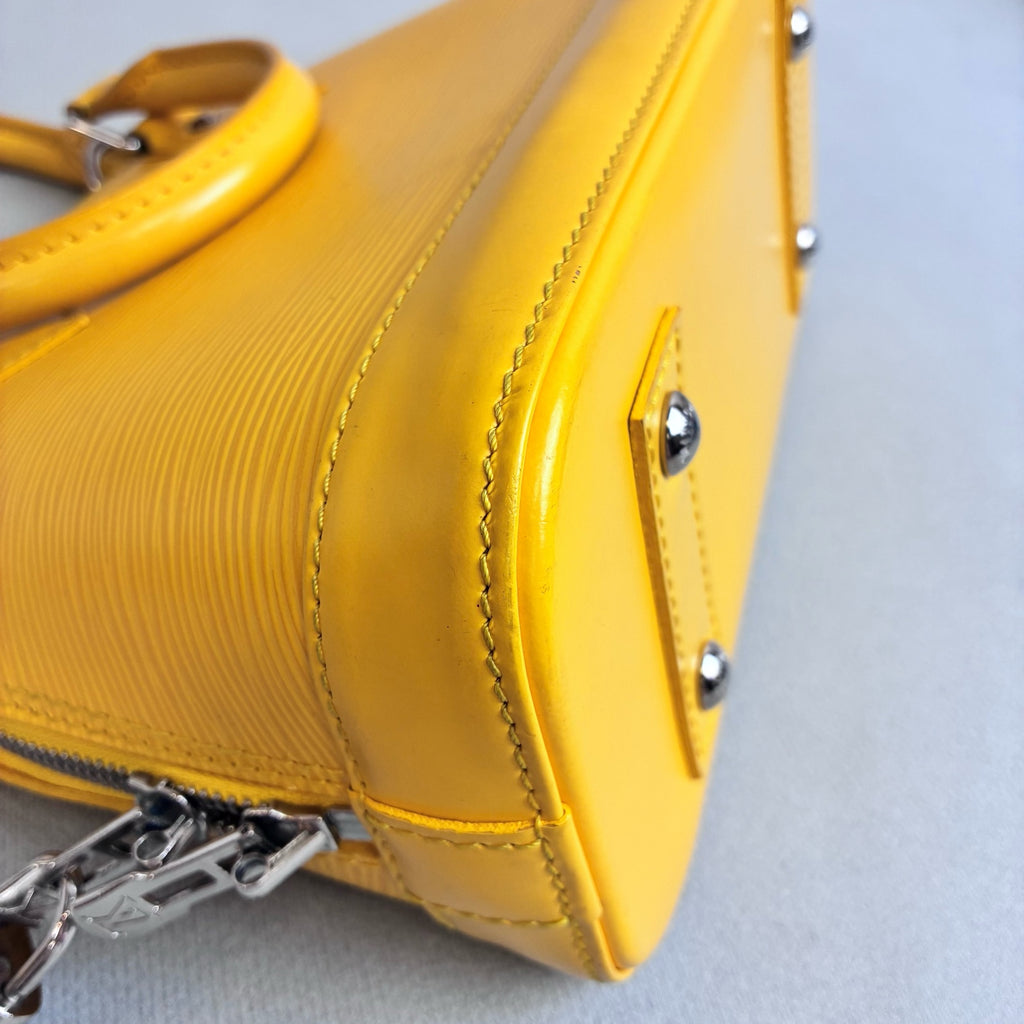 LV/Louis Vuitton Yellow Ripple Leather Shell BB Size 24*17.5 Year 2013 98% new One lock with two keys