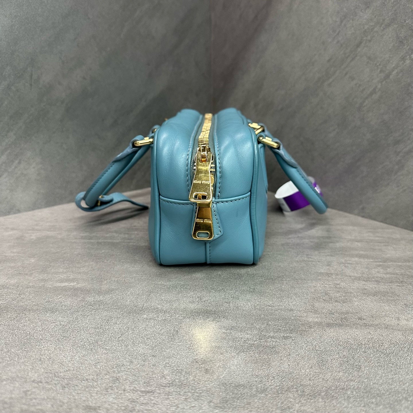 miumiu Miu Miu small bowling bag, sky blue, with shoulder strap, in stock at a favorable price