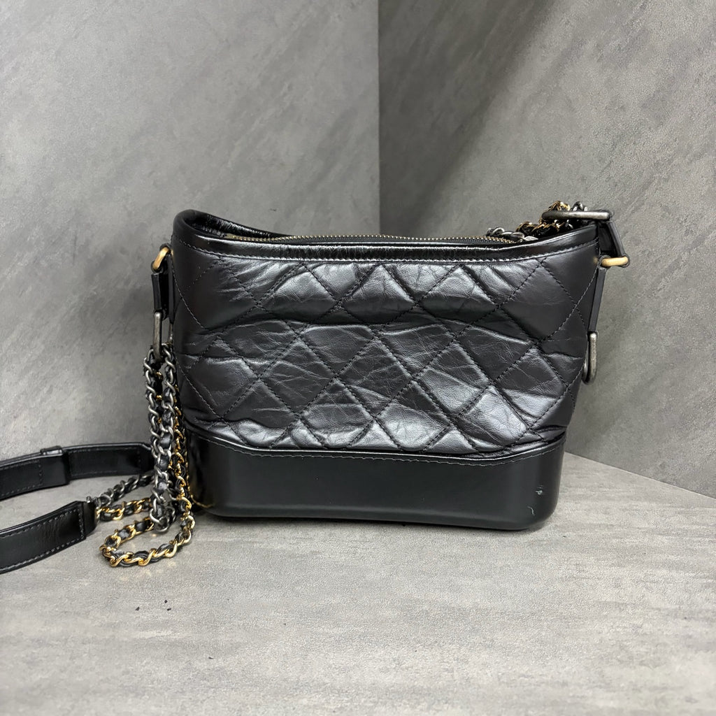 Chanel Black Gold Gabrielle Bag, small size, 25 series with authenticity card, structured silhouette, clean interior