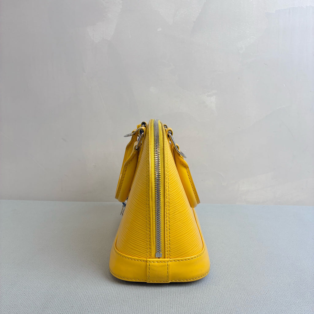 LV/Louis Vuitton Yellow Ripple Leather Shell BB Size 24*17.5 Year 2013 98% new One lock with two keys