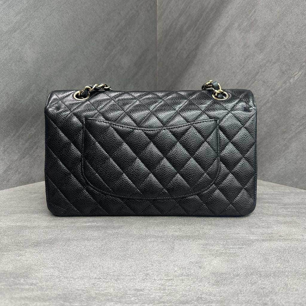 Chanel cf medium size black gold lychee cowhide 27k card with clean inside and in stock at a good price
