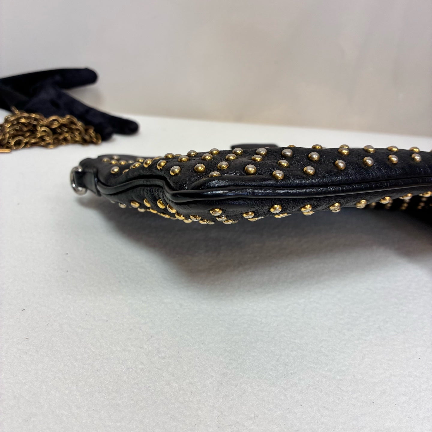 Miu Miu 95% new black studded clutch with gold stud embellishments, size: 18*14*5cm.