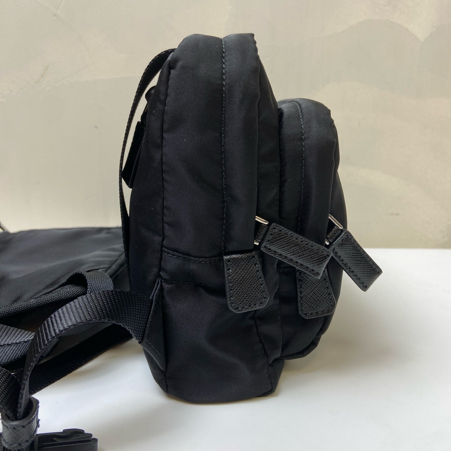 Prada Black and Silver Nylon Multifunctional Backpack Show Style, Backpack in 99% New Condition Dimensions: 22×17 Black and Silver Nylon Material