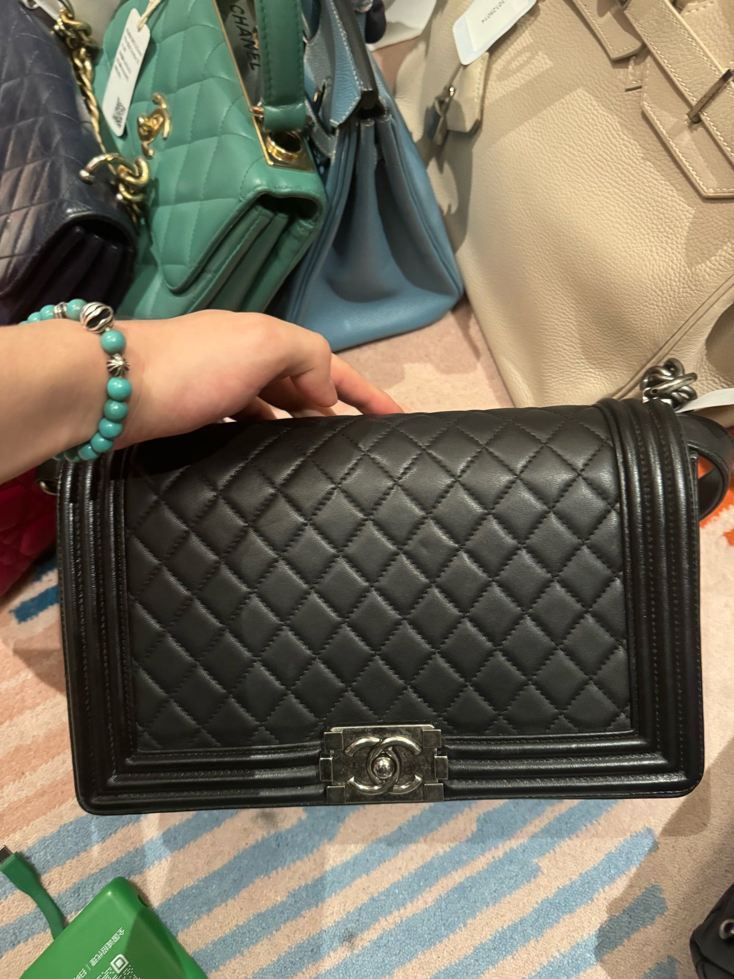 Chanel Le Boy medium-large size, 21 series, black with silver hardware, in stock at a favorable price