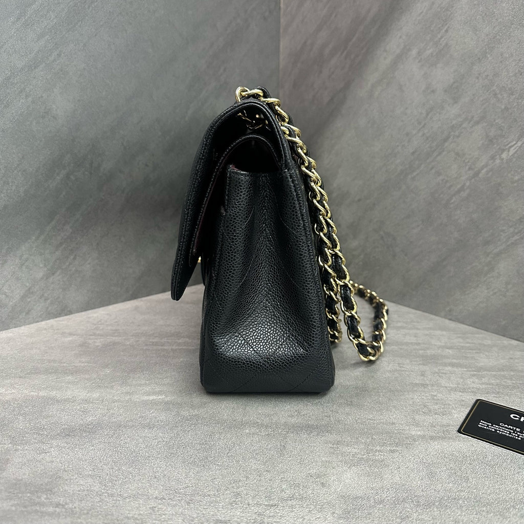 Chanel CF Jumbo black-grain calfskin chain bag in black and gold, 16 serial with authenticity card, structured silhouette, clean interior