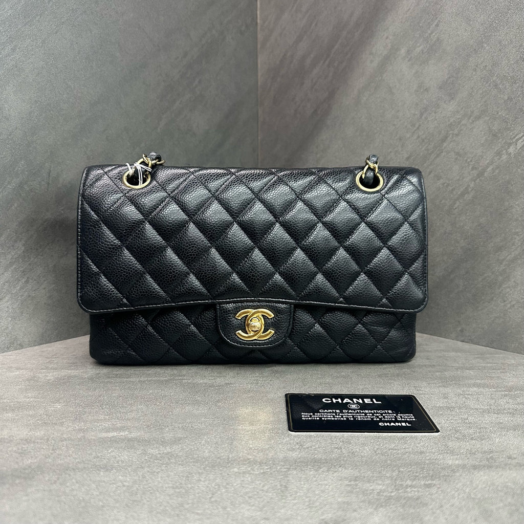 Chanel cf medium size black gold lychee cowhide 27k card with clean inside and in stock at a good price