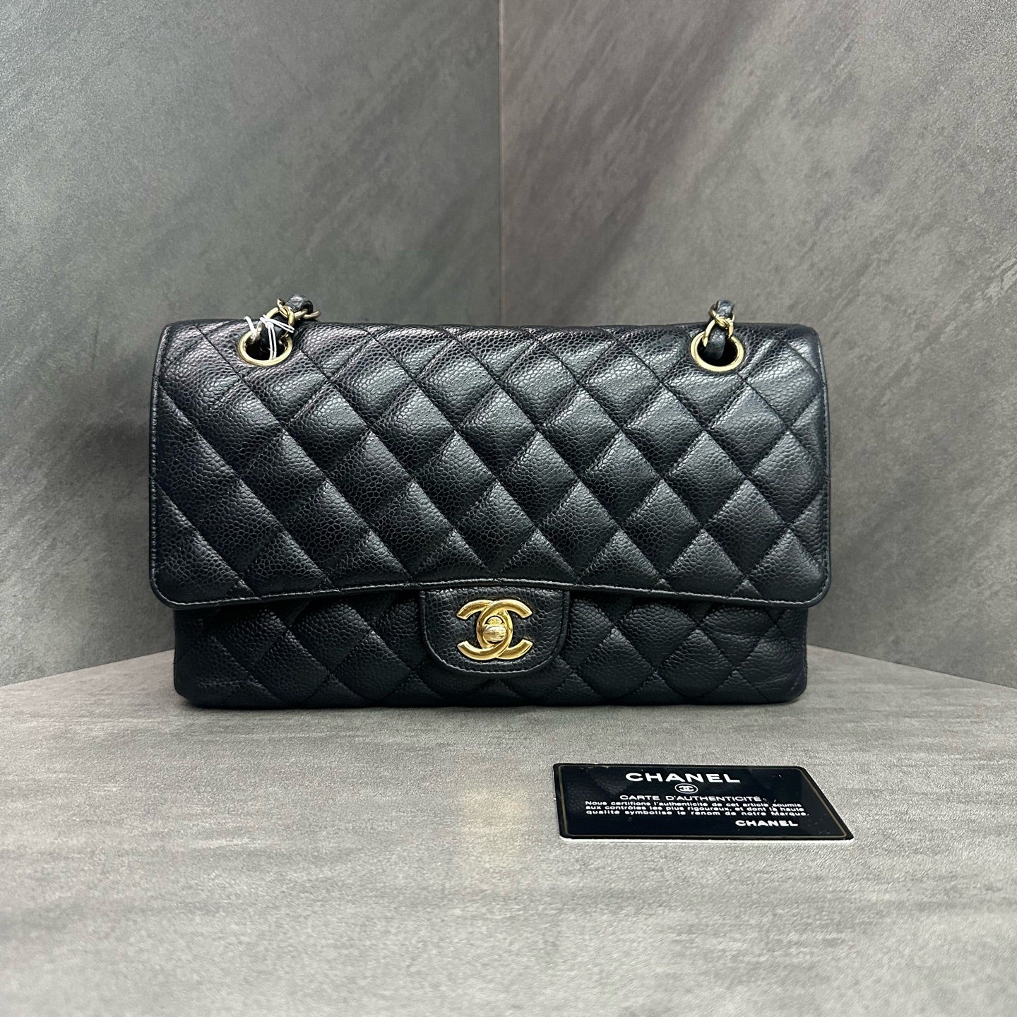Chanel cf medium size black gold lychee cowhide 27k card with clean inside and in stock at a good price