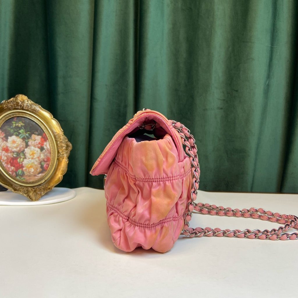 Prada Pink Pleated Chain Bag! Pink pleated parachute material shoulder underarm crossbody chain bag, paired with a silver lock. Size: 23*15.