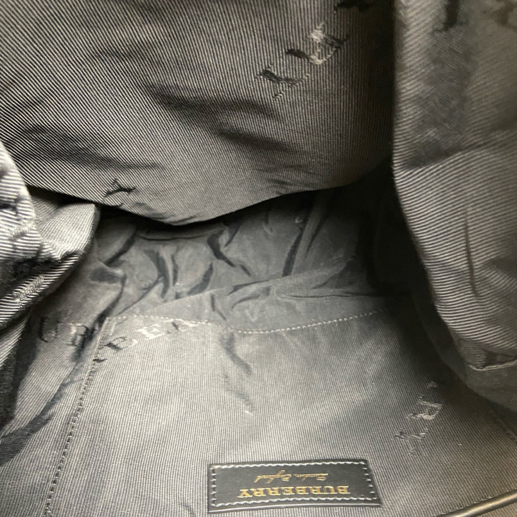 Burberry The Rucksack Series Classic Backpack with Engraving, Classic Black and Gold Color Scheme, Subtle and Sophisticated.