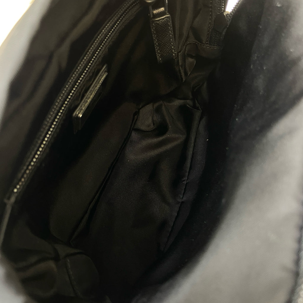 Prada Black and Silver Nylon Multifunctional Backpack Show Style, Backpack in 99% New Condition Dimensions: 22×17 Black and Silver Nylon Material