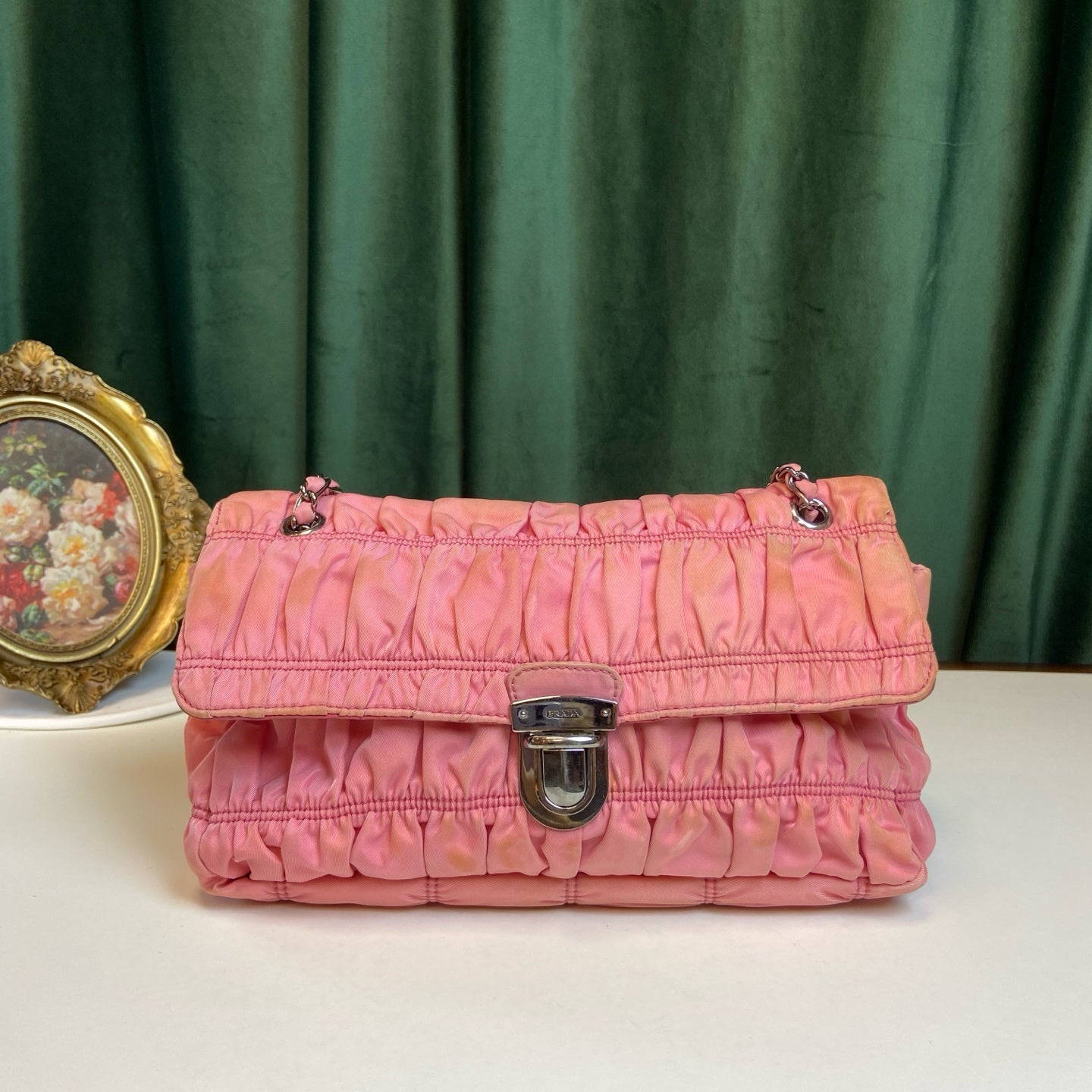 Prada Pink Pleated Chain Bag! Pink pleated parachute material shoulder underarm crossbody chain bag, paired with a silver lock. Size: 23*15.