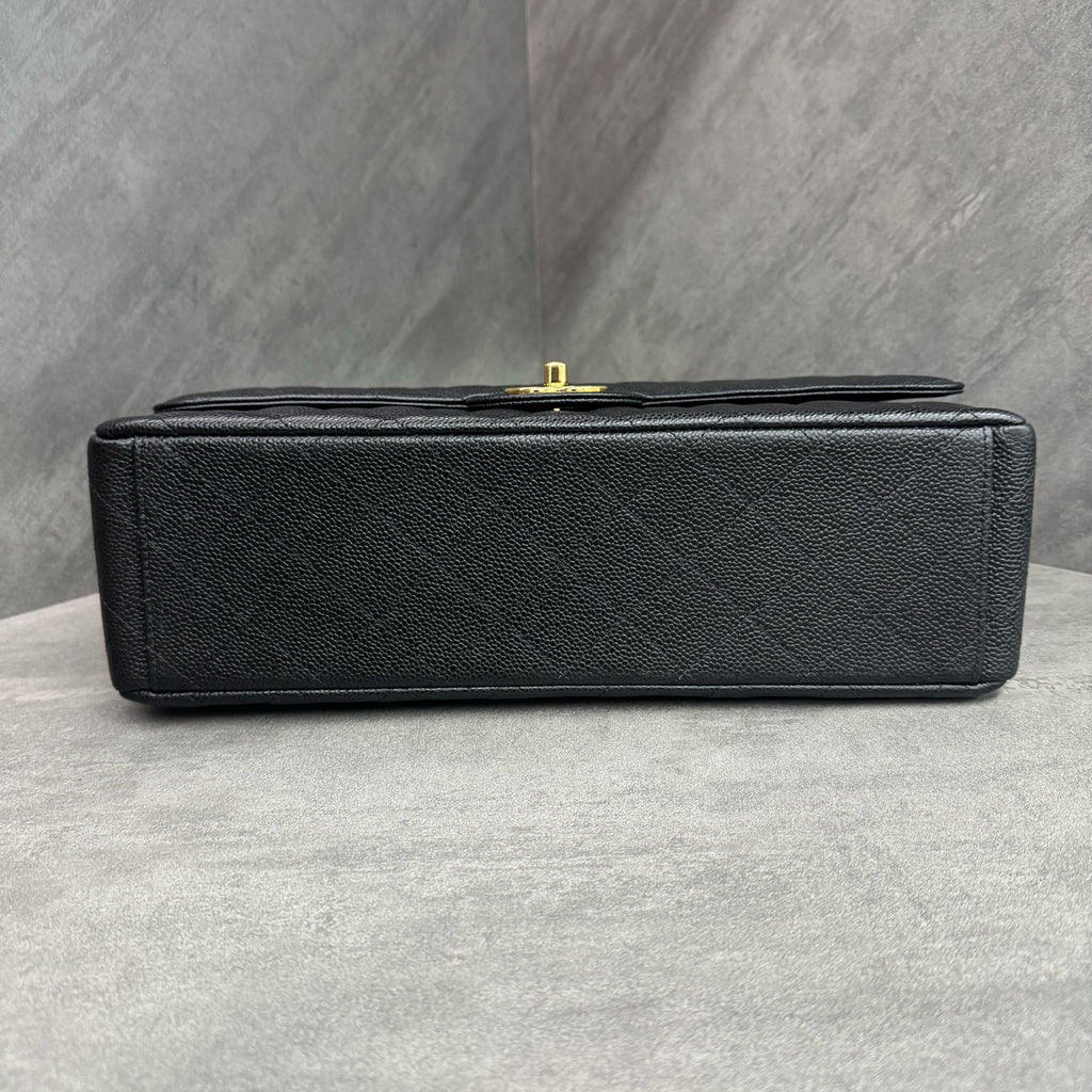 Chanel Black Gold Litchi Calfskin Maxi, full set with 28 serial number, structured shape, clean interior, in stock at a favorable price
