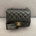 The original color of the Chanel black gold square fat man 29K card with strap