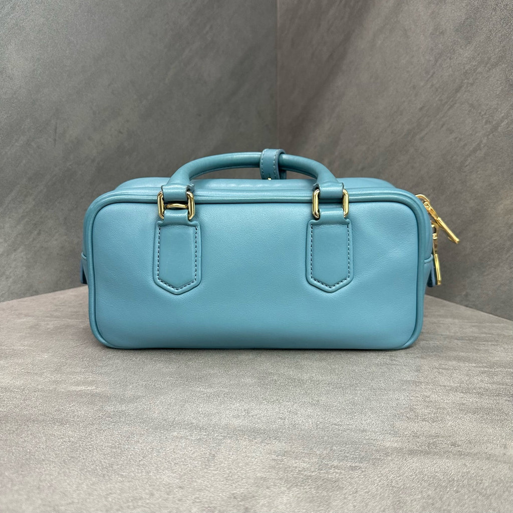 miumiu Miu Miu small bowling bag, sky blue, with shoulder strap, in stock at a favorable price