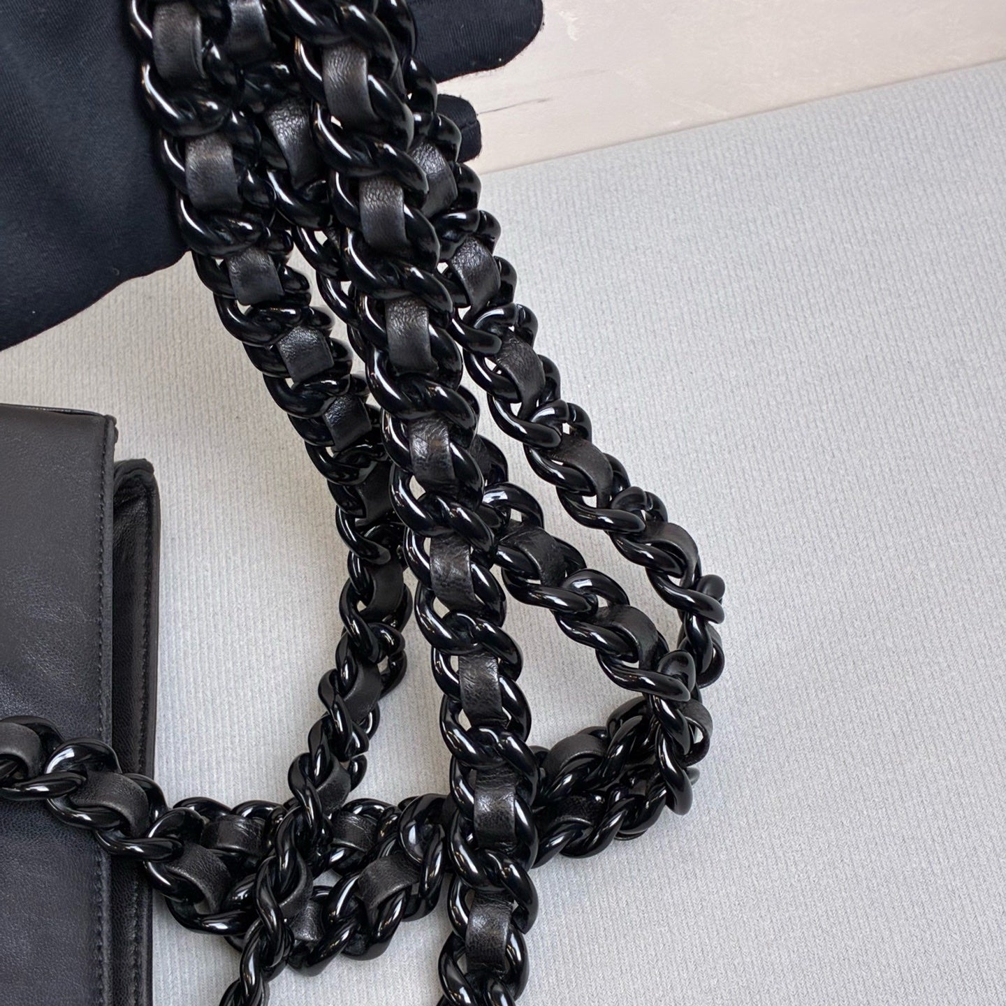 98% New PRADA Black Chain Handbag, Made in Italy from Black Leather. The chain shoulder strap is very textured, with a large capacity, perfect for everyday outings.