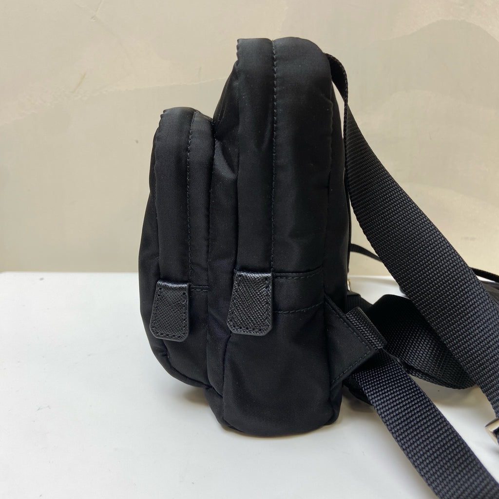 Prada Black and Silver Nylon Multifunctional Backpack Show Style, Backpack in 99% New Condition Dimensions: 22×17 Black and Silver Nylon Material
