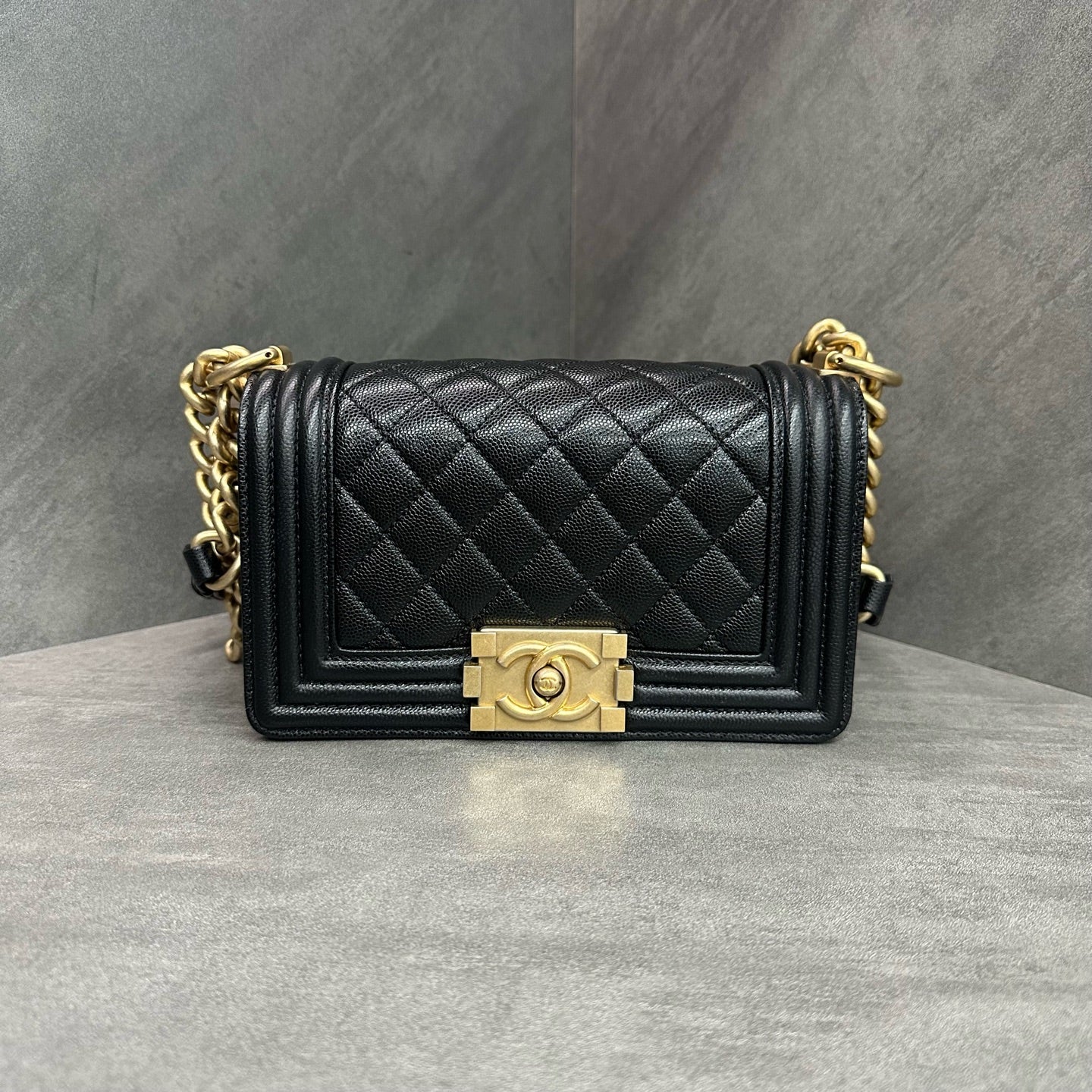 Chanel Le Boy Small Black Gold Lambskin Chain Bag 26 opening, structured shape, clean interior.