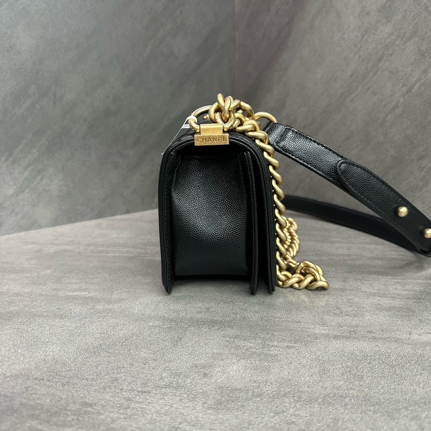 Chanel Le Boy Small Black Gold Lambskin Chain Bag 26 opening, structured shape, clean interior.