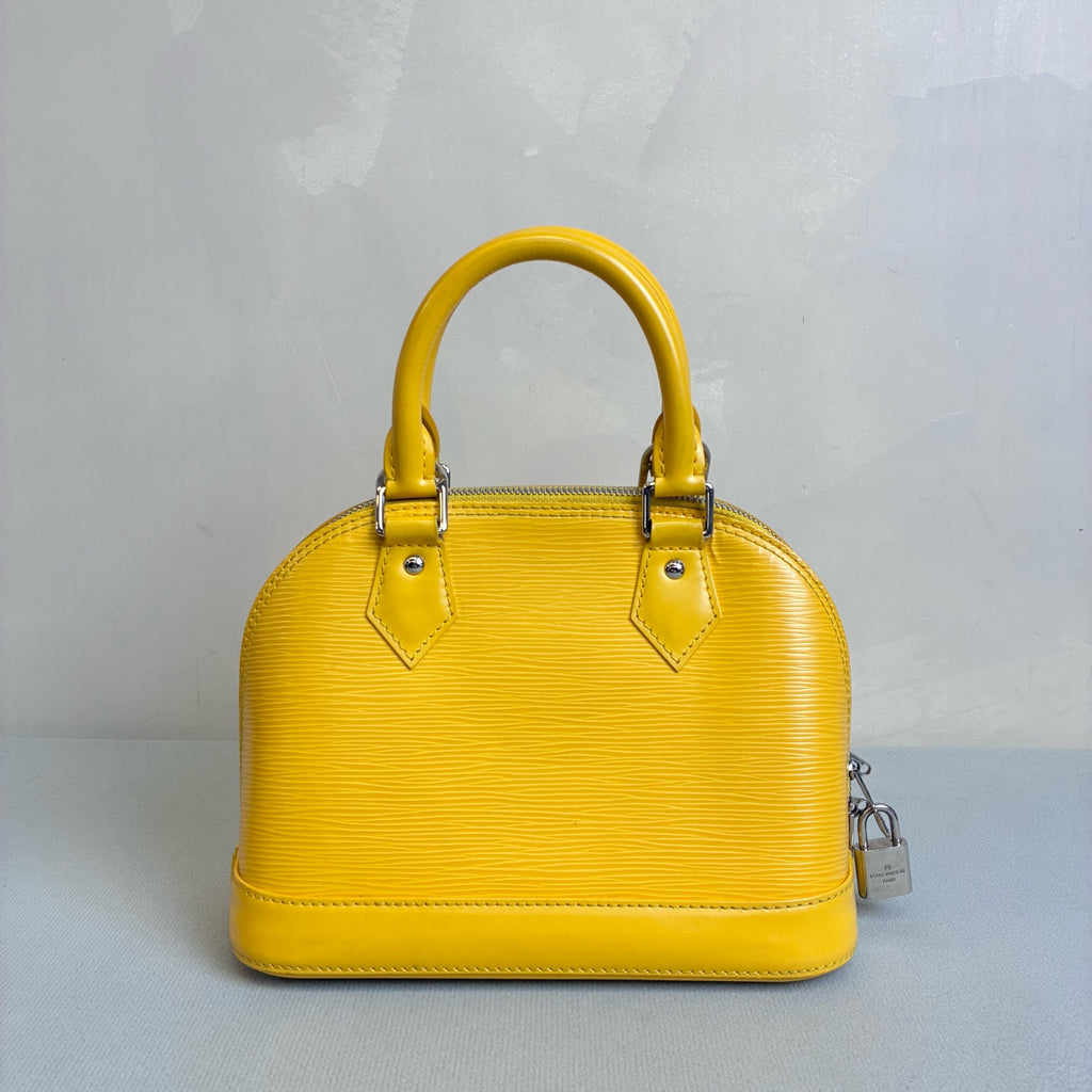 LV/Louis Vuitton Yellow Ripple Leather Shell BB Size 24*17.5 Year 2013 98% new One lock with two keys