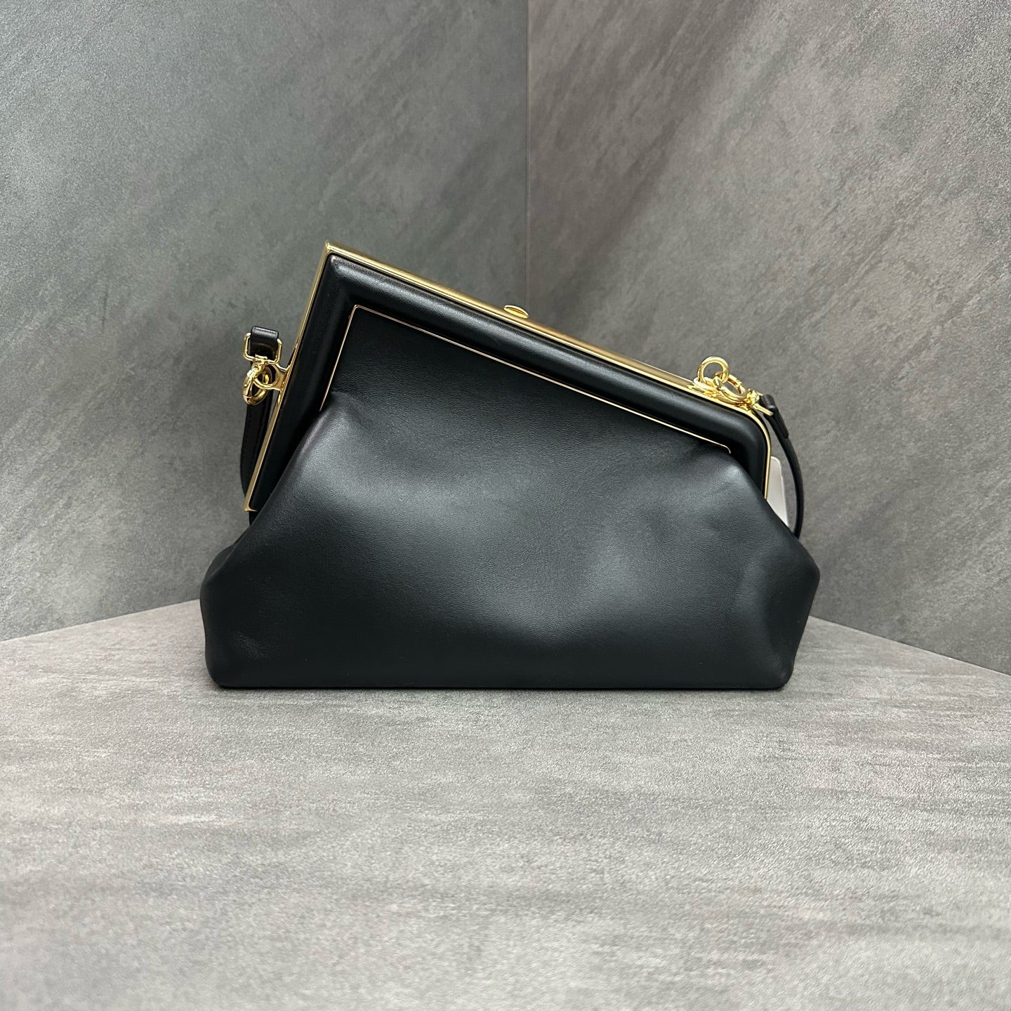 Fendi First handbag Dinner bag is made of soft black Napa leather