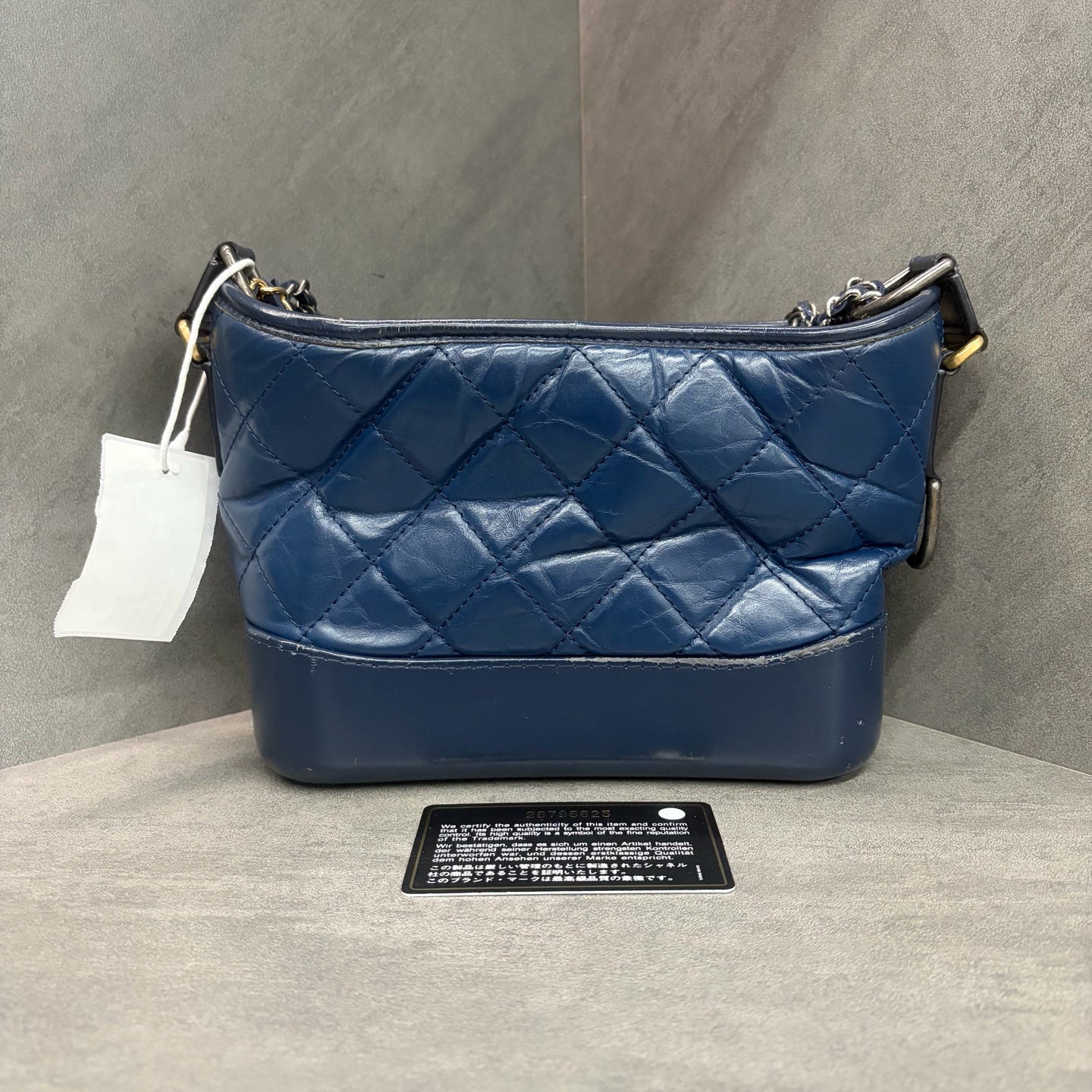 Chanel Gabrielle small size, gold-tone hardware, calfskin, navy blue, 26th production code, with authenticity card