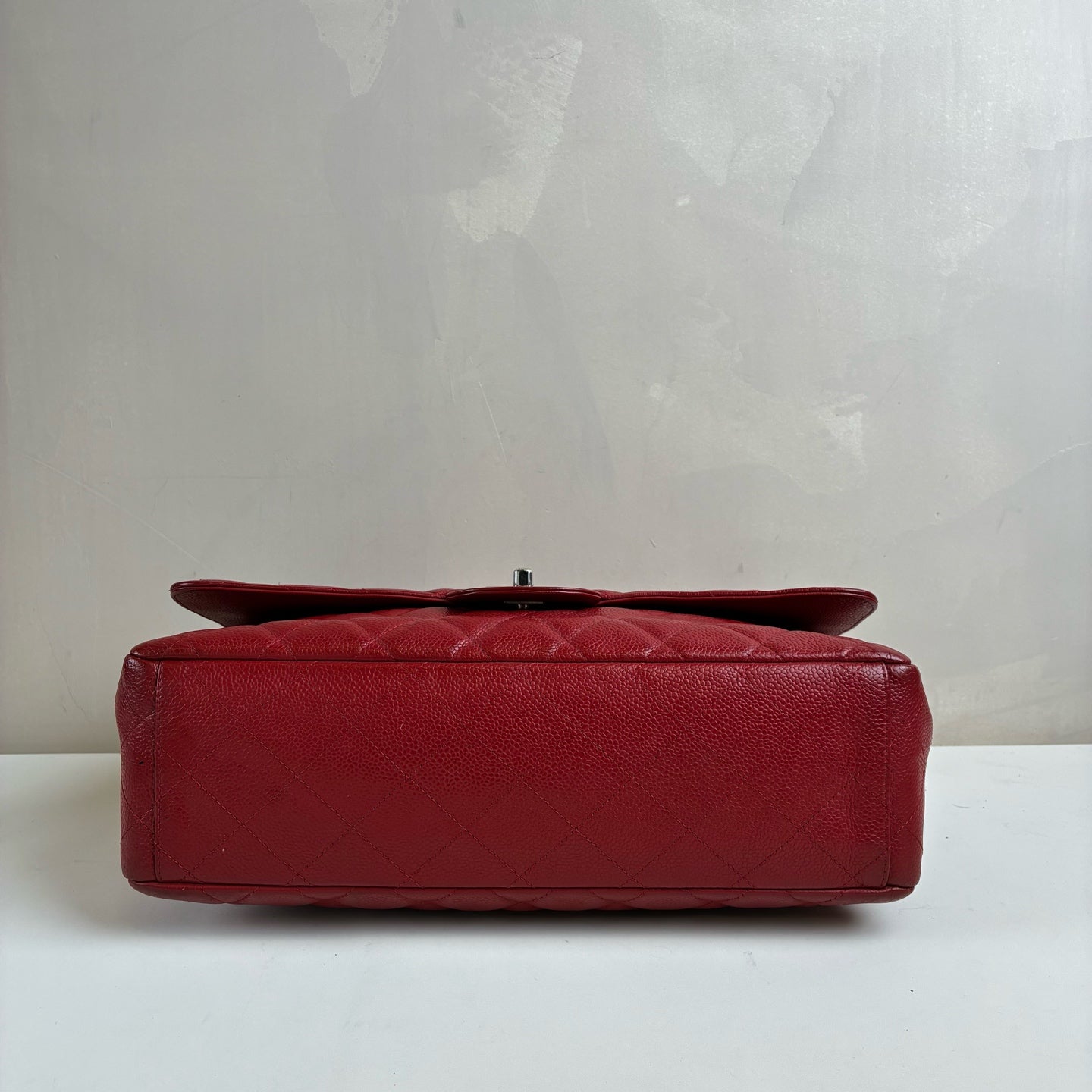 CHANEL cf jumbo max 13-inch red diamond-patterned lychee grain leather shoulder bag with silver chain buckle, bottom length