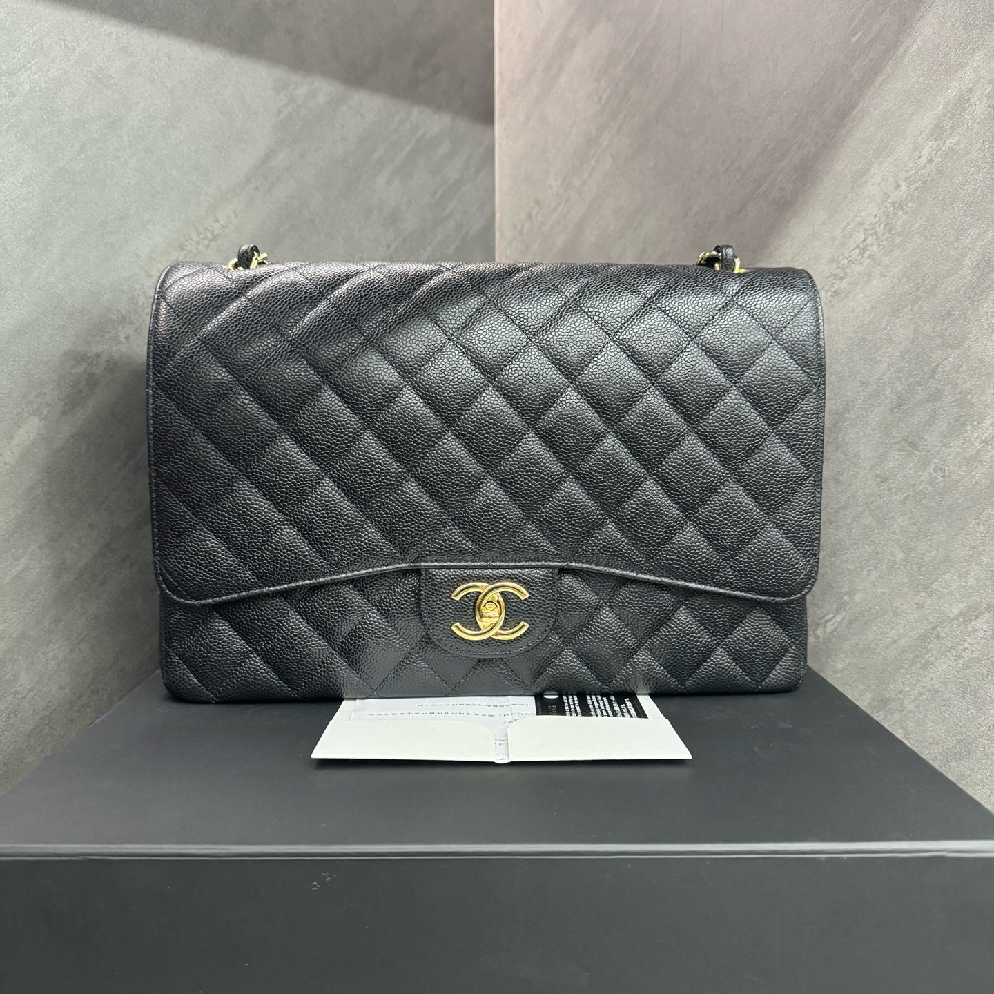 Chanel Black Gold Litchi Calfskin Maxi, full set with 28 serial number, structured shape, clean interior, in stock at a favorable price