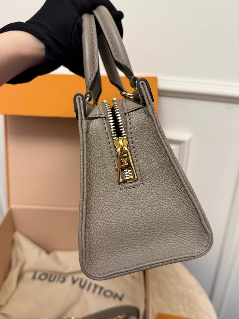LV Onthego elephant gray 24