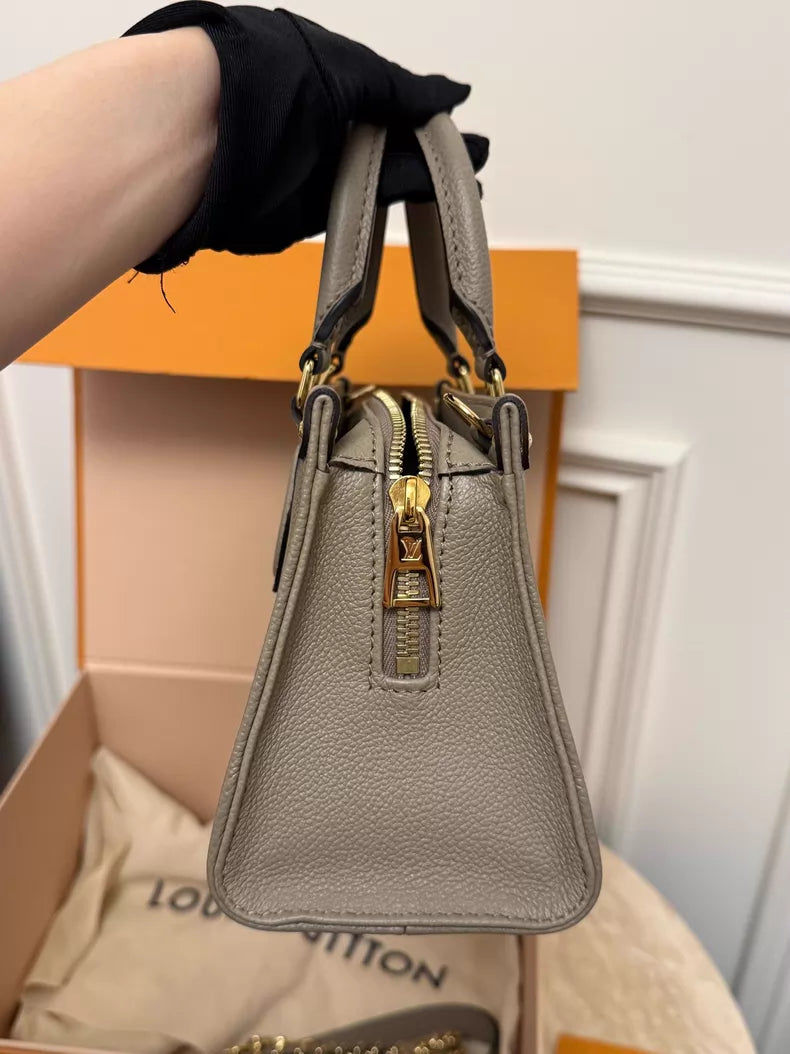 LV Onthego elephant gray 24