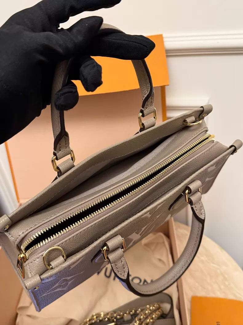 LV Onthego elephant gray 24
