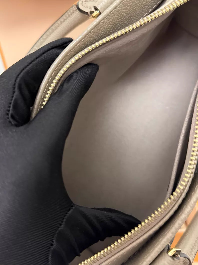 LV Onthego elephant gray 24