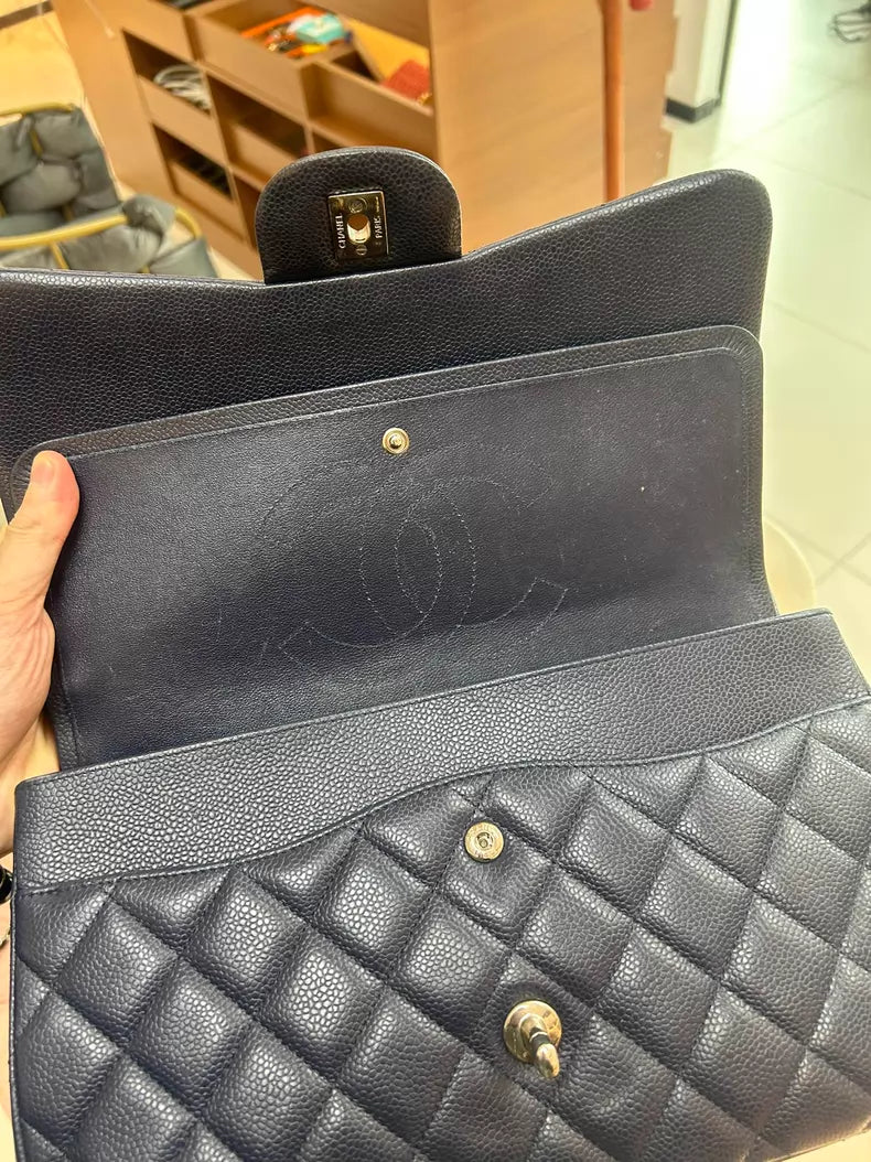 Chanel Chanel cf jumbo pebbled leather dark blue 19