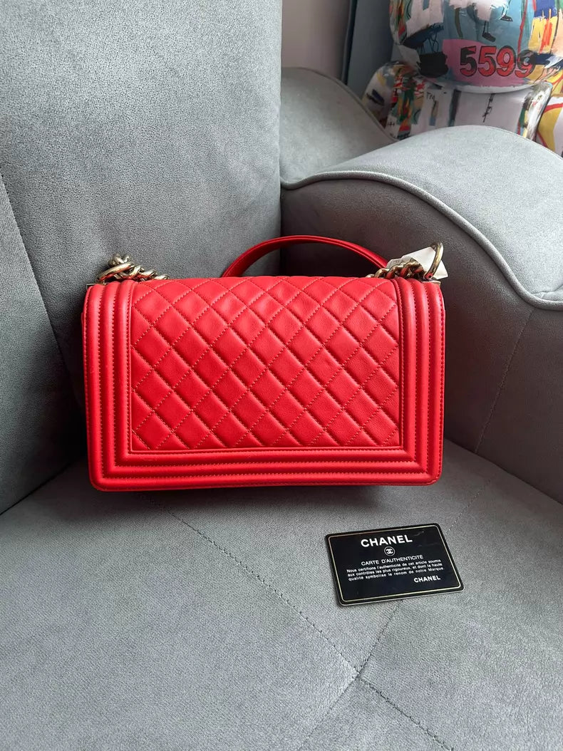 CHANEL Chanel Leboy medium orange red gold hardware 24