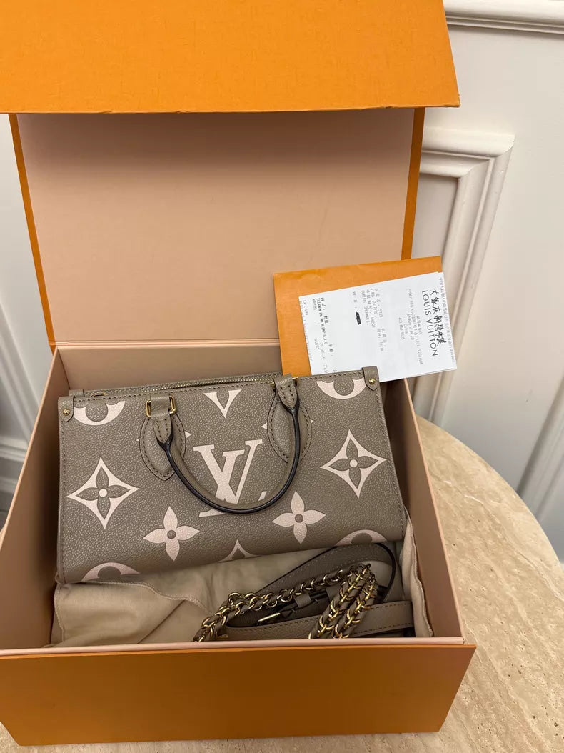 LV Onthego elephant gray 24
