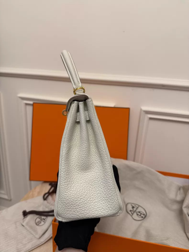 Hermes Hermes kelly25 milk white gold hardware togo